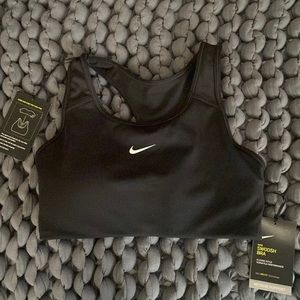 NWT Nike Swoosh sports bra. Medium. Black never worn